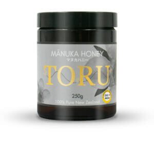 a 250g Glass jar of Toru Manuka Honey in MGO30+ activity