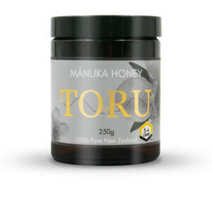 glass jar of UMF5+ Manuka honey