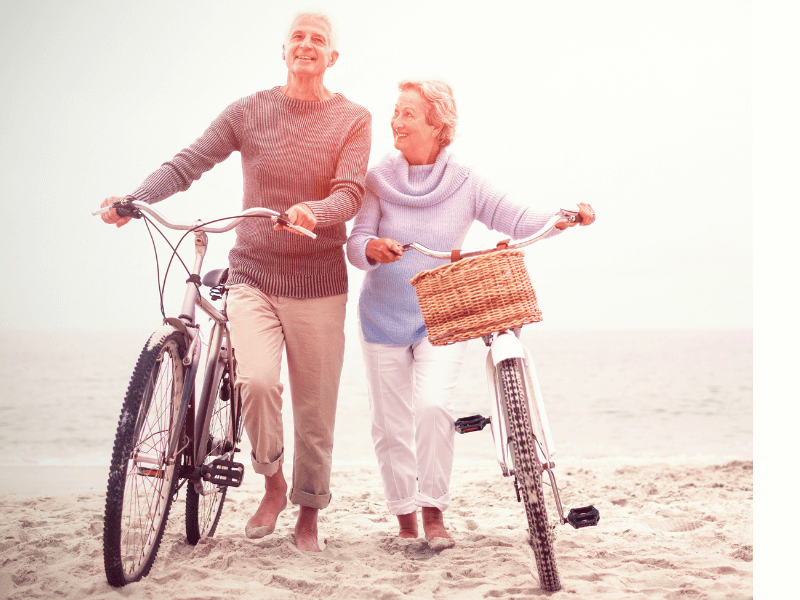 image of older couple with bicycles enjoying life together